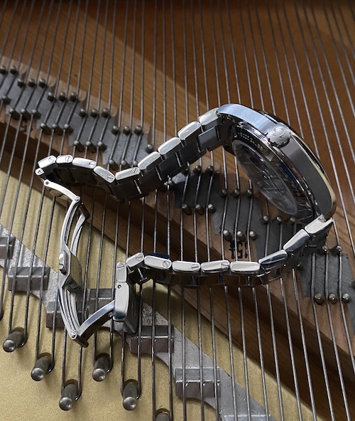 OMEGA Aqua Terra on piano